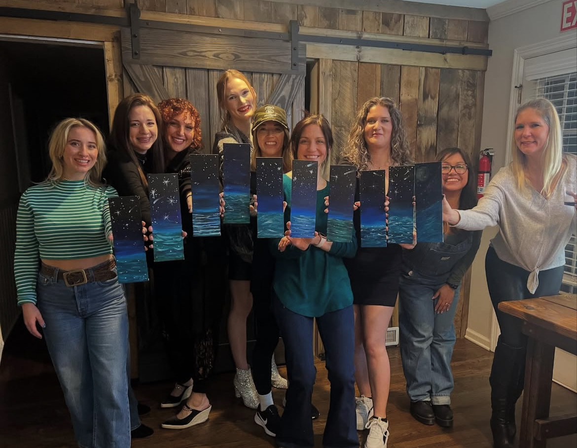 Group art class with students learning